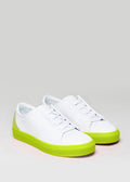 white and yellow premium leather low pair of sneakers in clean design frontview