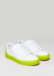 white and yellow premium leather low pair of sneakers in clean design frontview