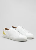yellow with white premium leather low sneakers with white sole in clean design frontview