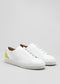 jaune avec cuir blanc premium low sneakers avec semelle blanche dans un design propre frontview
