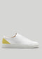 giallo e bianco in pelle premium sneakers con suola bianca in design pulito vista laterale